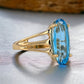 Yellow 14k gold oval topaz ring