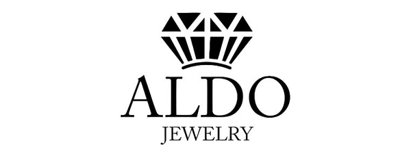 The logo for Aldo Jewelry. There is a stylized gemstone on top of the word Aldo in large letters, on top of the word Jewelry in letters about half the size.